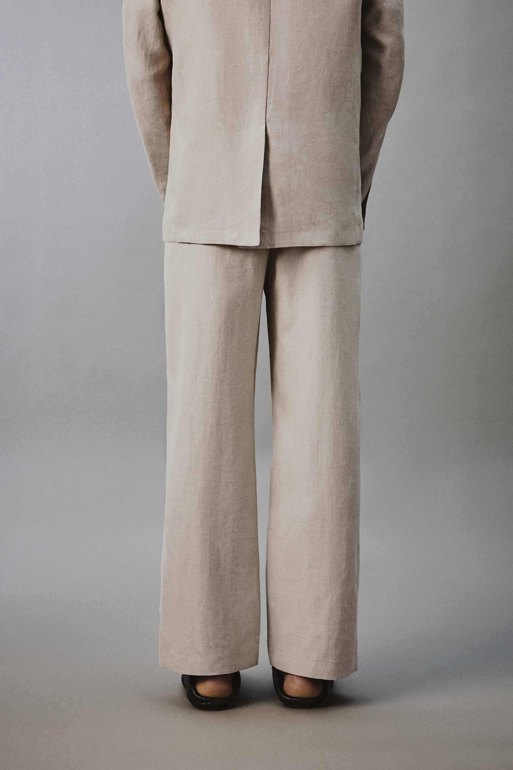 PANTALON À PLIS EN COTON ET LIN